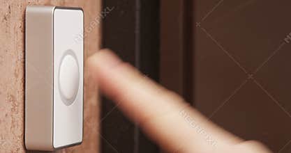 Ringing doorbell with finger man and woman at day