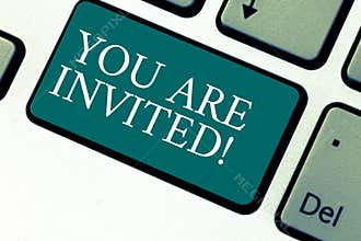 Handwriting text You Are Invited. Concept meaning Receiving and invitation for an event Join us to celebrate Keyboard