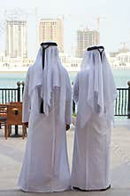 Two Anonymous Arab Men & Construction Buidings