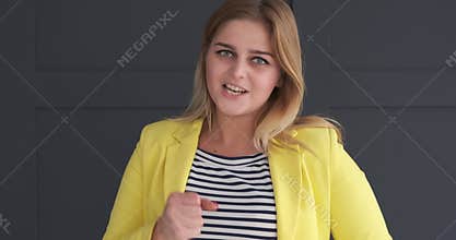 Businesswoman gesturing and speaking for advertisement