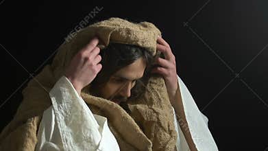 Jesus Christ looking on sky, asking father for help and mercy, blessing God
