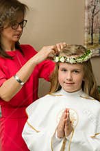 Girl getting ready for her first holy communion event