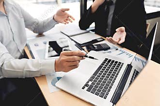 Teamwork company meeting concept, business partners working with laptop computer together analysing startup financial project