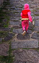 A child going runs at vellore fort