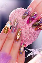 Human fingers with long fingernail