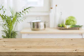 Table top with blurred kitchen interior as background