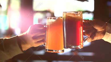 Beer clinking glasses slow-mo.