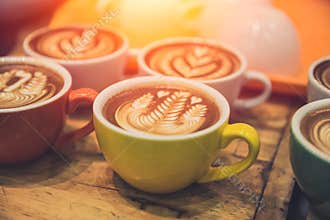 Coffee latte art popular hot drink served on wood table