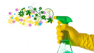 Spring cleaning concept. Floral detergent sprayed by a hand with
