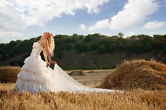 Bride in autumn field