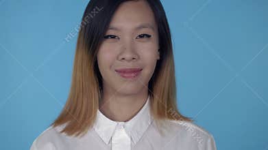 Korean happy female showing gesture ok