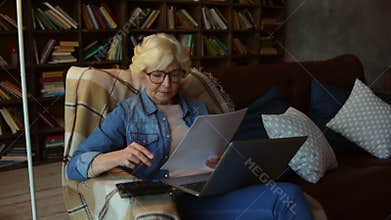 Concentrated senior woman making her financial planning