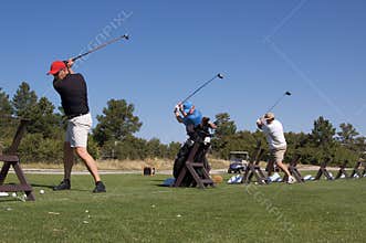 Golfers on Practice Range