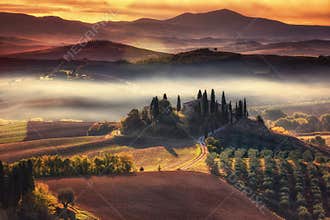 Tuscany, panoramic landscape with famous farmhouse rolling hills