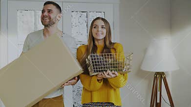 Happy couple happy to enter their new home at first time