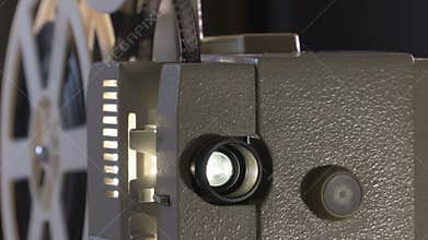 Amateur cinema. Projector for 8mm film. 1960s, 1970s, 1980s years. Home cinema. Film super 8. Footage clip 4k