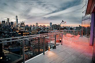 Luxury city rooftop balcony with chilling area in New York City Manhattan midtown. Elite real estate concept.
