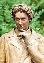 Dutch artist performing on the street during the International Festival of Living Statues