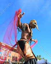 Tempe, Arizona: Street Entertainer in Mardi Gras Costume