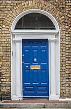 Blue classic door in Dublin, example of georgian typical architecture of Dublin Ireland