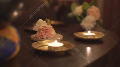 Close up shot on ayurveda healing yoda meditation buddhism religion items tibetan singing bowl scented candles on table