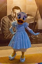 Daisy Duck in a blue formal dress