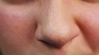 Close-up video of person who wants to sneeze. Allergies, having cold. Healthcare