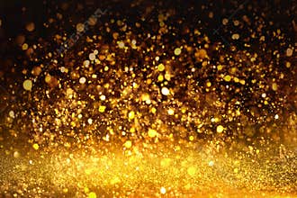 Golden glitter texture Colorfull Blurred abstract background for birthday, anniversary, wedding, new year eve or Christmas