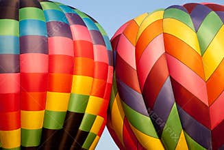 Two Hot air balloons bumping