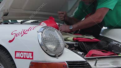 Porsche 911 classic 1963 man packs trunk car, vintage model