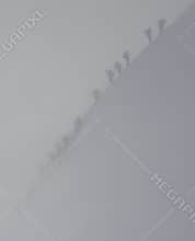 Climbers in snowstorm