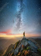 Silhouette of a champion on mountain peak
