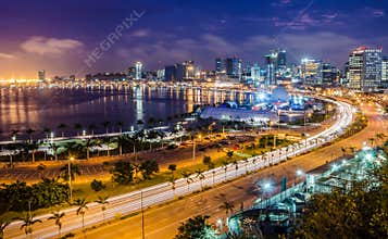 Skyline of capital city Luanda, Luanda bay and seaside promenade with highway during afternoon, Angola, Africa