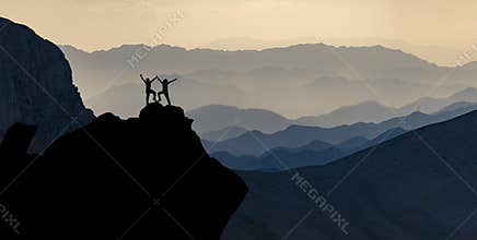 Spectacular mountain ranges and the adventure of successful mountaineers