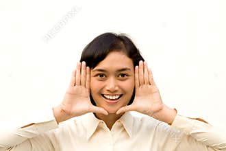 Young woman framing face