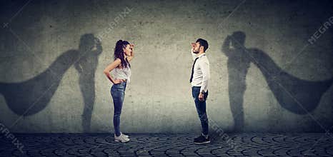 Brave man and woman posing as super hero