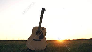 Acoustic guitar in the field
