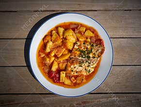 Seabass fish recipe oven with tomatoes and potato