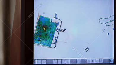 Scanned baggage on the x-ray scanner screen at the airport