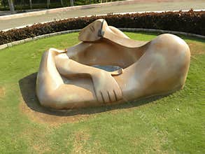 Hyderabad, India - January 1, 2009 Beige modern art statue of a man at Ramoji Film City