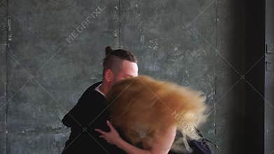 A couple dancing salsa. Young couple dancing the salsa at the dance hall.
