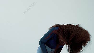 Beauty black mixed race african american woman with long curly hair and perfect smile