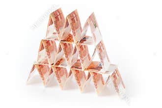 House of cards from Russian money. Pyramid from the bills. White