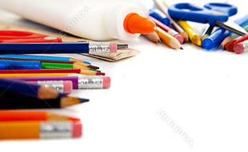 Various school supplies on a white background
