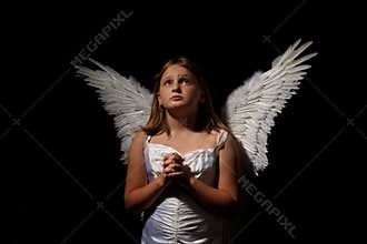 Little angel girl at night