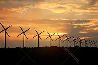 3D rendering of windmills producing engergy in the evening