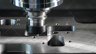 Close-up shot of a milling cutting machine in process.