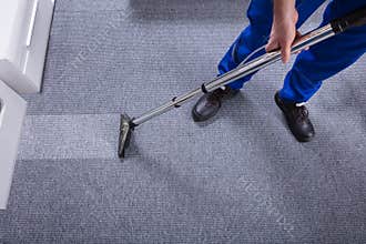 Janitor Cleaning Carpet