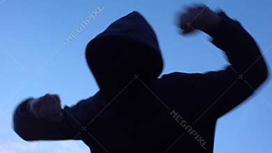 Aggressive hooligan hitting camera, online game, cruel city criminal attack