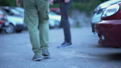 Honest man returning lost wallet to owner on street, human support and help